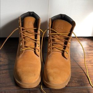 Waterproofed Timberlands in decent condition.